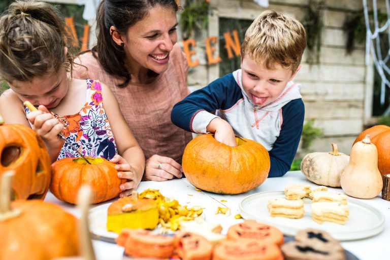 Carving pumpkins with mom